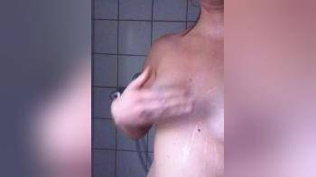 video of soaping up her tits under shower