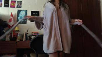 video of Curly young girl strips of her bathrobe