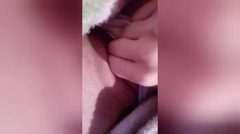 video of playing with her pussy under her blanket 