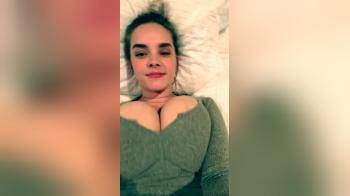 video of Bouncing her huge tits in a sweater