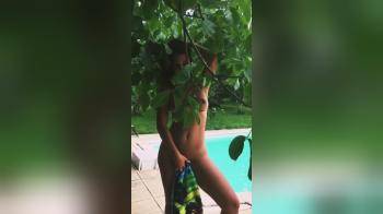 video of Naked showoff at her pool outside