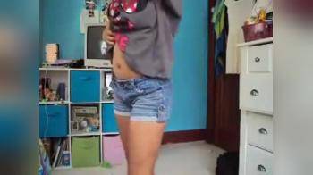 video of girl dancing in her bedroom in bikini