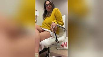 video of Yellow sweater under her skirt bating in the office