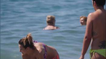 video of On the beach topless enjoying the sun