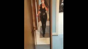 video of Tight leather pvc outfit