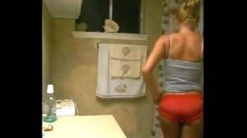 video of Tattooed Blonde Teen Films Herself Teasing in Bathroom