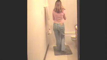 video of babe in Jeans preparing for a shower