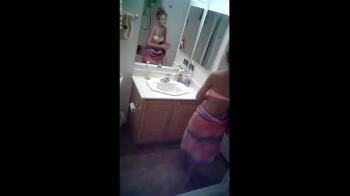 video of voyeur on cute babe in bathroom