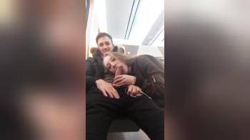video of She sucks his cock in public train