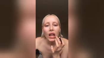 video of Topless albino blonde doing make up