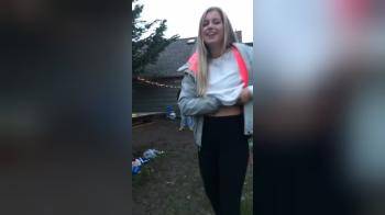 video of Blonde Flashing her tits outside backyard
