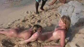 video of Eating Out Her Friend at the Beach