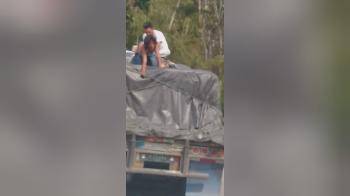 video of Fucking on top of a moving truck