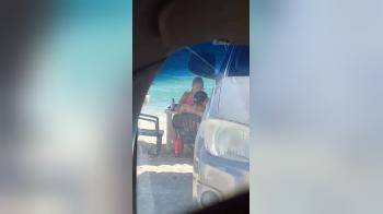 video of Couple has sex on the beach