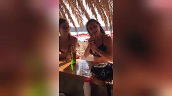 video of Open beer-bottles with mouth and flashes tits
