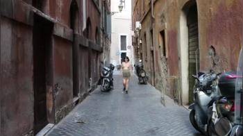 video of Walking topless in a back ally