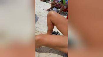 video of Tanning her pussy lips