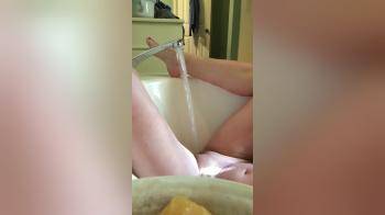 video of She tests the bath faucet and likes it