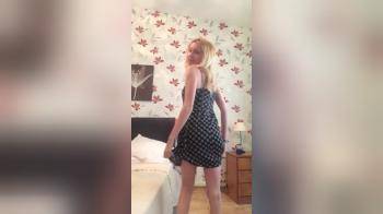 video of flat chested blonde does teasing strip
