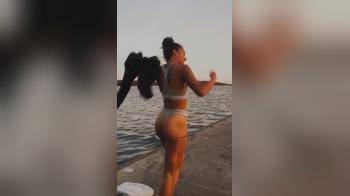video of Girl bathing in a thong