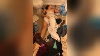 video of Pretty girl gets caught playing with herself in a messy bathroom