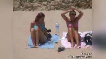 video of 2 chicks on the beach