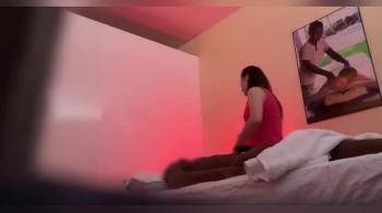 video of hot chick giving his big black dick a handjob in the massage parlor