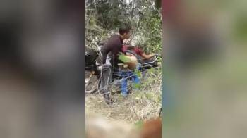 video of Couple gets filmed in the forrest giving eachother pleasure against his motorbike, he fingerfucks her and she sucks his dick