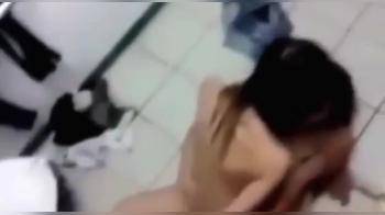 video of Guy films 2 chicks riding eachothers pussy on the floor in a public restroom