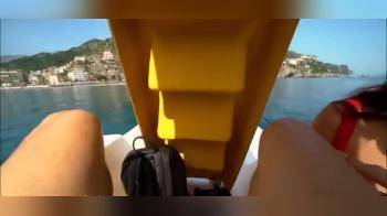 video of Naughty girlfriend giving a blowjob while relaxing on a pedalo during holiday at the lake