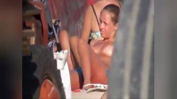 video of Hot babe topples on beach