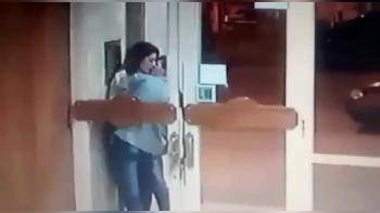 video of people having sex in front of a bank at night