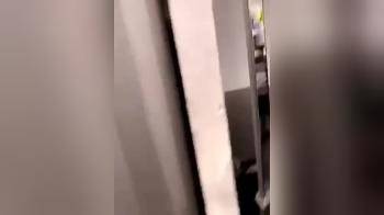 video of Young couple trying to have sex in a dressingroom but an employee finds out and breaks up their adventure