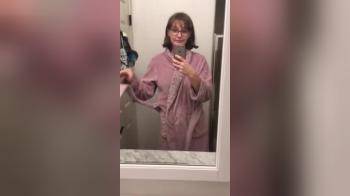 video of Brunette morning teasing near the mirror