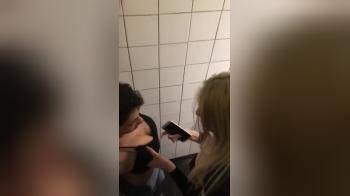 video of Tow lesbian girls having rough fun on nightclub toilet