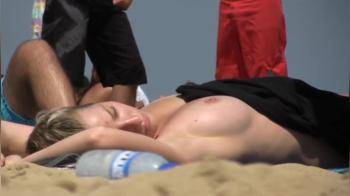 video of In the sun on the beach hot blonde