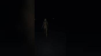 video of Walking naked in the middle of the road as a dare