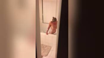 video of blonde wife masturbating with dildo in the bathtub