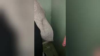 video of She sucks a man behind a wall gloryhole