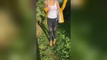 video of An out side flash in her sport outfit in vineyard