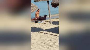 video of Younger GF caught riding a much older guy on the beach of Mallorca