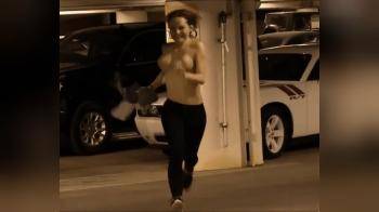 video of Topless Streak through Garage