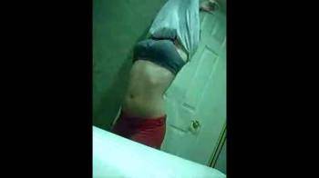 video of Teen strips in bathroom