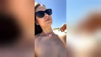 video of Topless nip rings at beach
