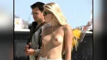 video of Public Topless Blonde Beauty with Butterfly Wings