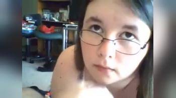 video of Really nerdy white girl sucks cum