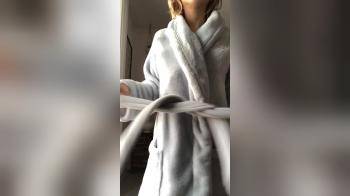video of showing body under robe