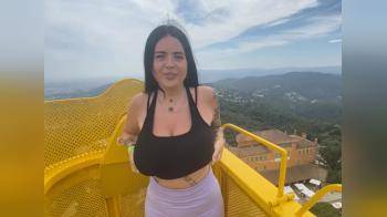 video of showing her big titties on top of the world