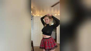 video of Cosplay in her school girl outfit stripping