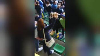 video of Guy has his hand in the Arse of his Girlfriend While they watch the game